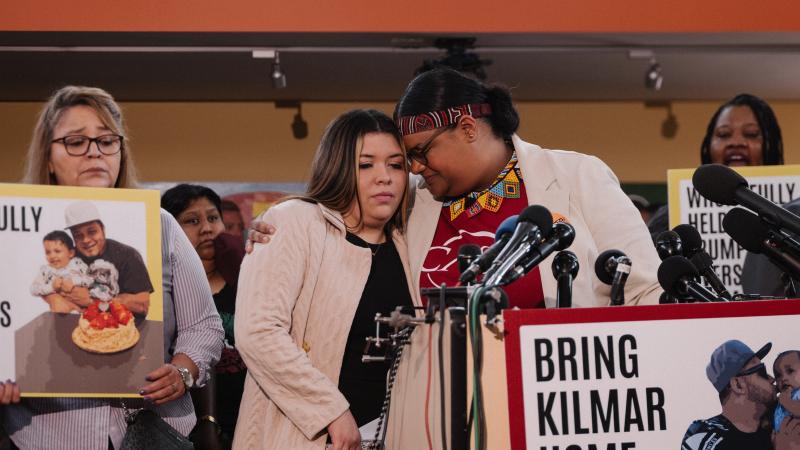 Jennifer, center, whose husband Kilmar Abrego Garcia was deported by ICE, is hugged by a staff member of CASA, at the CASA Multicultural Center during a press conference ahead of Garcia's hearing.